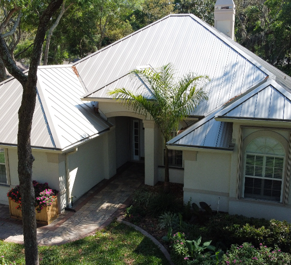 White house with metal roof