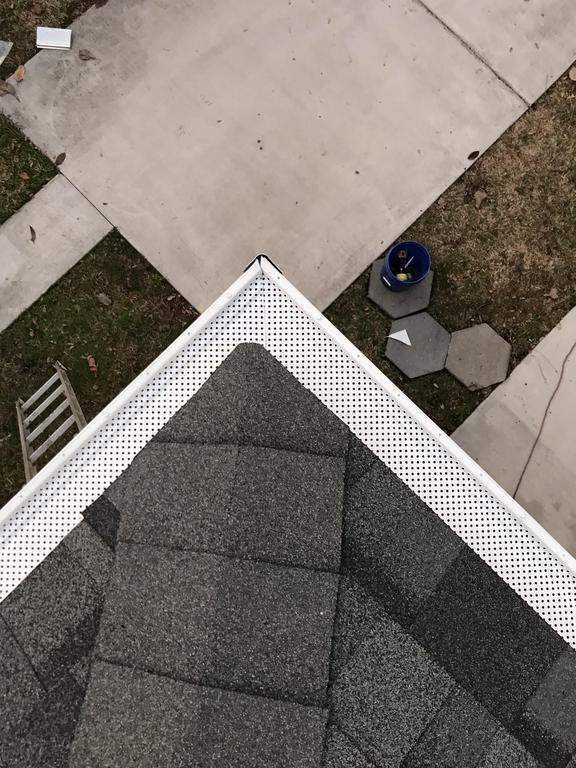 An overhead view of a home with gutter guards.