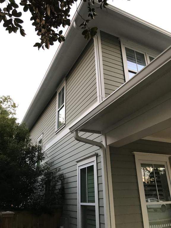A photo of a home with new seamless gutters.